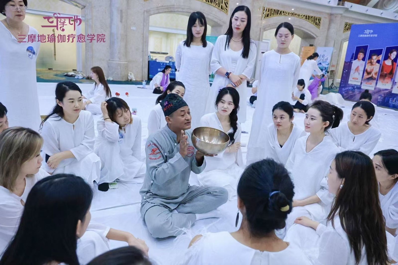 Saroj Shakya teaching bowl technique to students in Chongqing